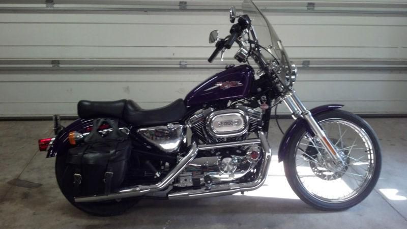 2000 Harley Davidson 1200 Custom Sportster with less than 2100 miles.