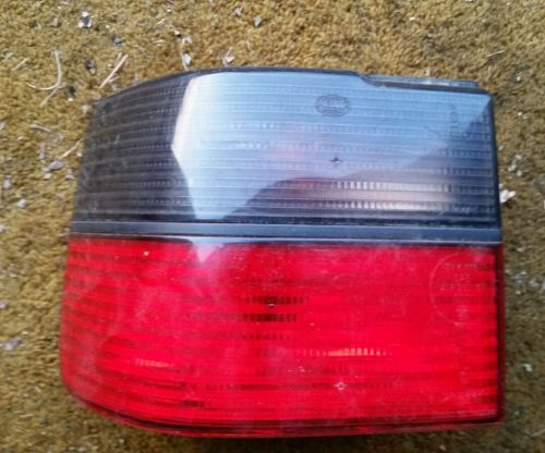 VW MK3 93-99 Jetta Vento Driver Side Rear Tail Light Red/Smoked OEM