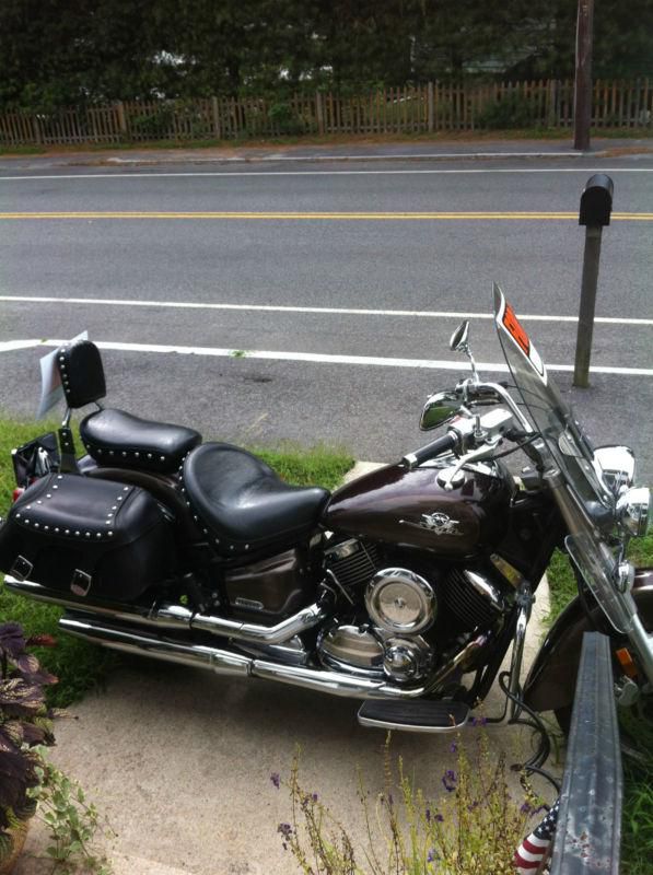 Great cond., wind guard, leather saddle bags, running lights, 26,000 mi.