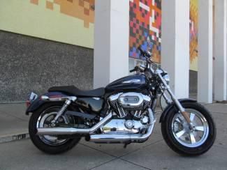 2012 blue harley xl1200c sportster, fat front tire kit,very nice and affordable