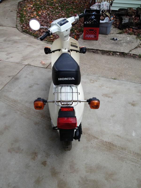 1984 White Honda Spree moped with only 854 miles on it. 1 owner.