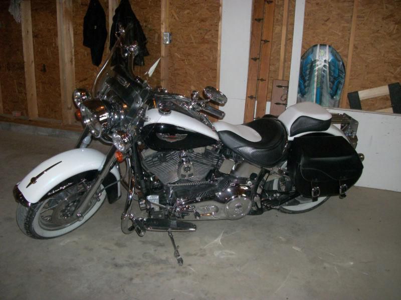 2005 heritage softail deluxe.  17k miles, black and white. nice!