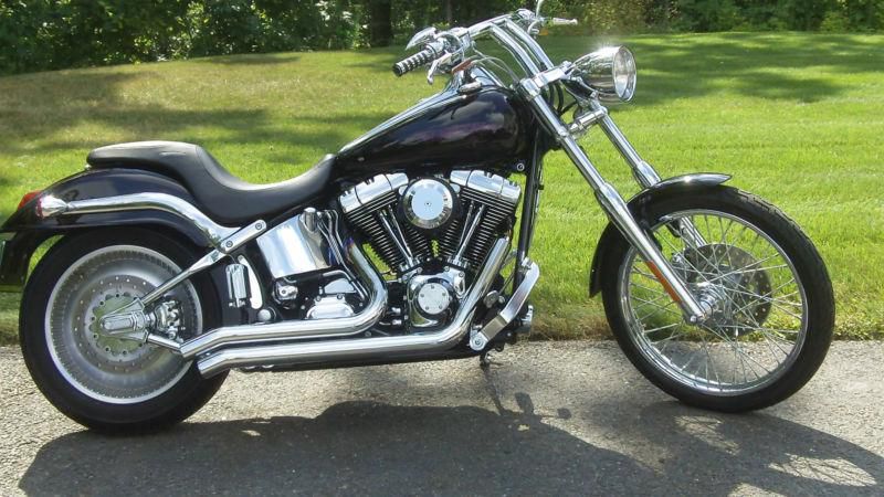 2002 Duece, Black with Factory ghost flames, only 1250 miles , brand new bike
