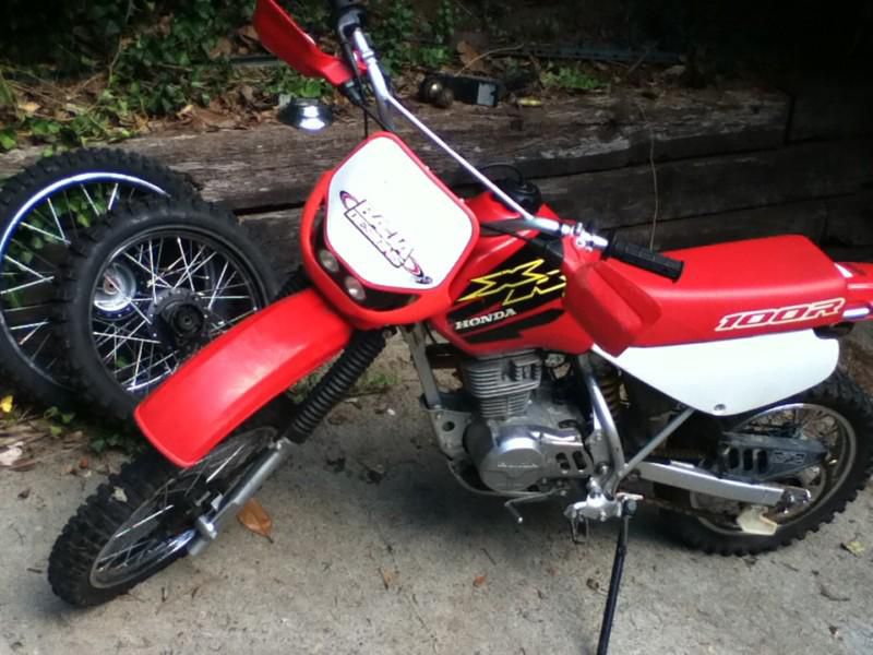 Honda XR100 package with spare XR80 wheels and a Baja Designs headlight kit
