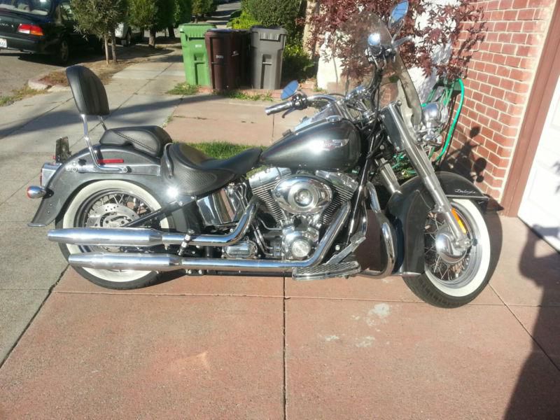 Beautiful Black Pearl Softail Deluxe, Apprx. 8,800 miles, garage kept, extras.