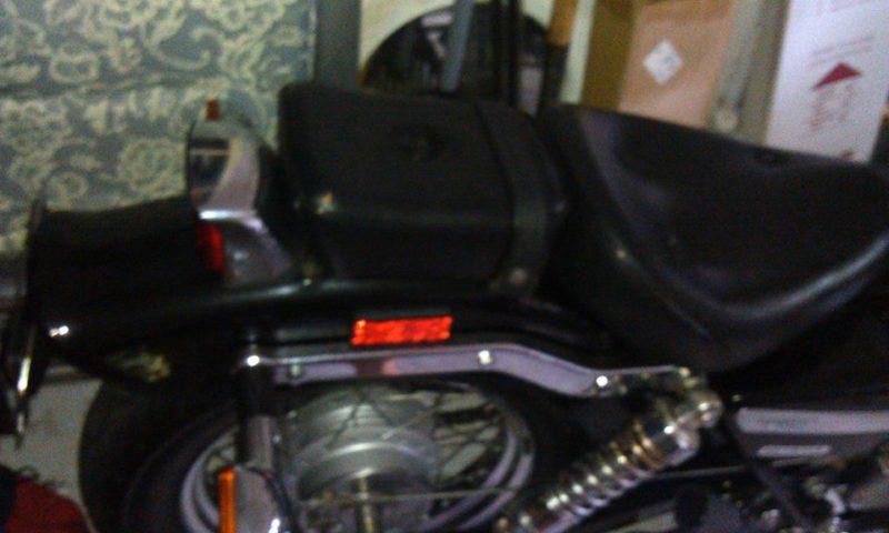 Black, very clean used motorcycle.