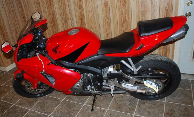 2006 HONDA CBR RR 600 mint condition with 1100 miles. Stored in heated garage